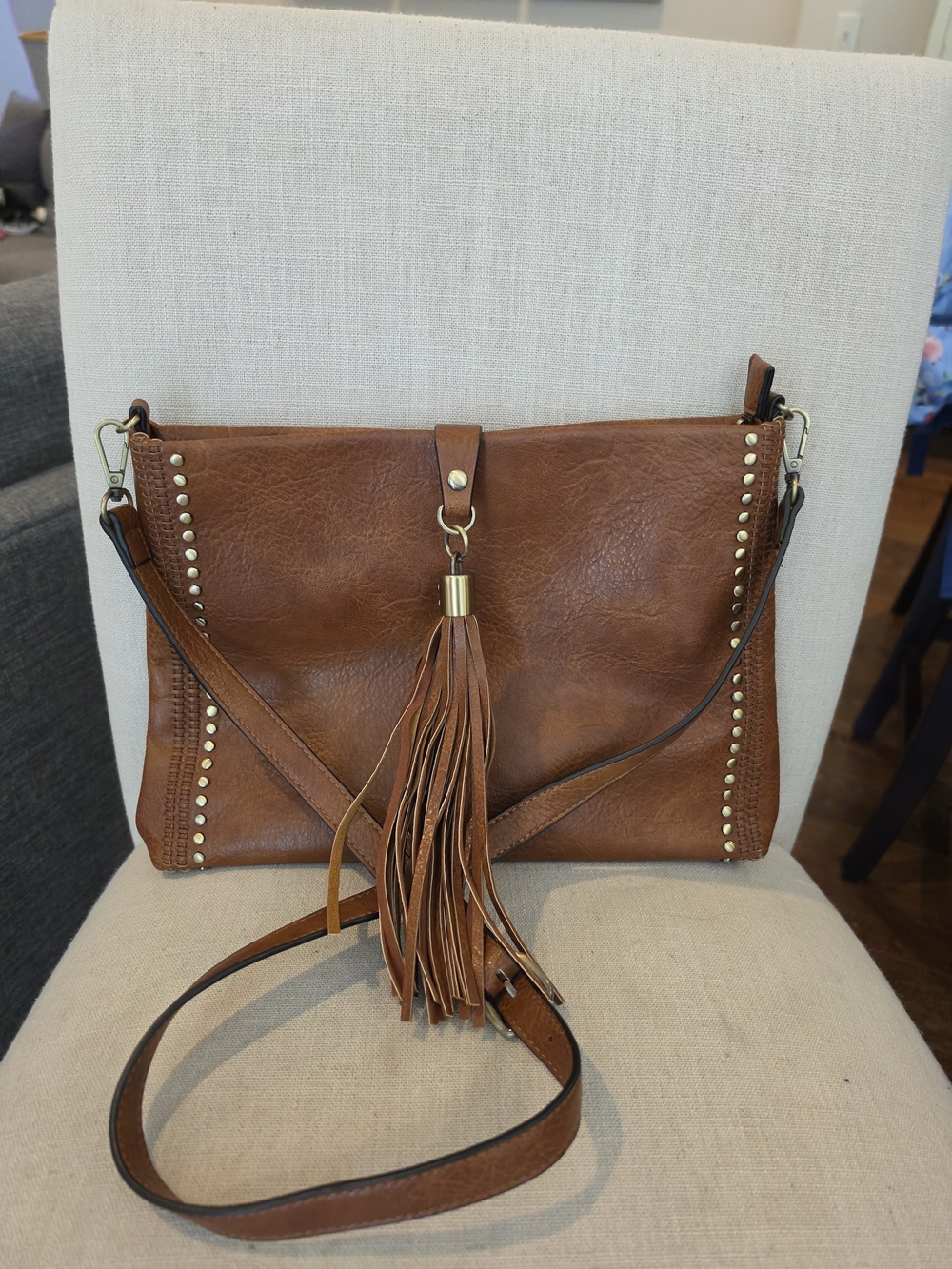 Chestnut Brown Tassel Crossbody Bag with Stud Detailing